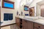 Master Bathroom with twin sinks and large shower